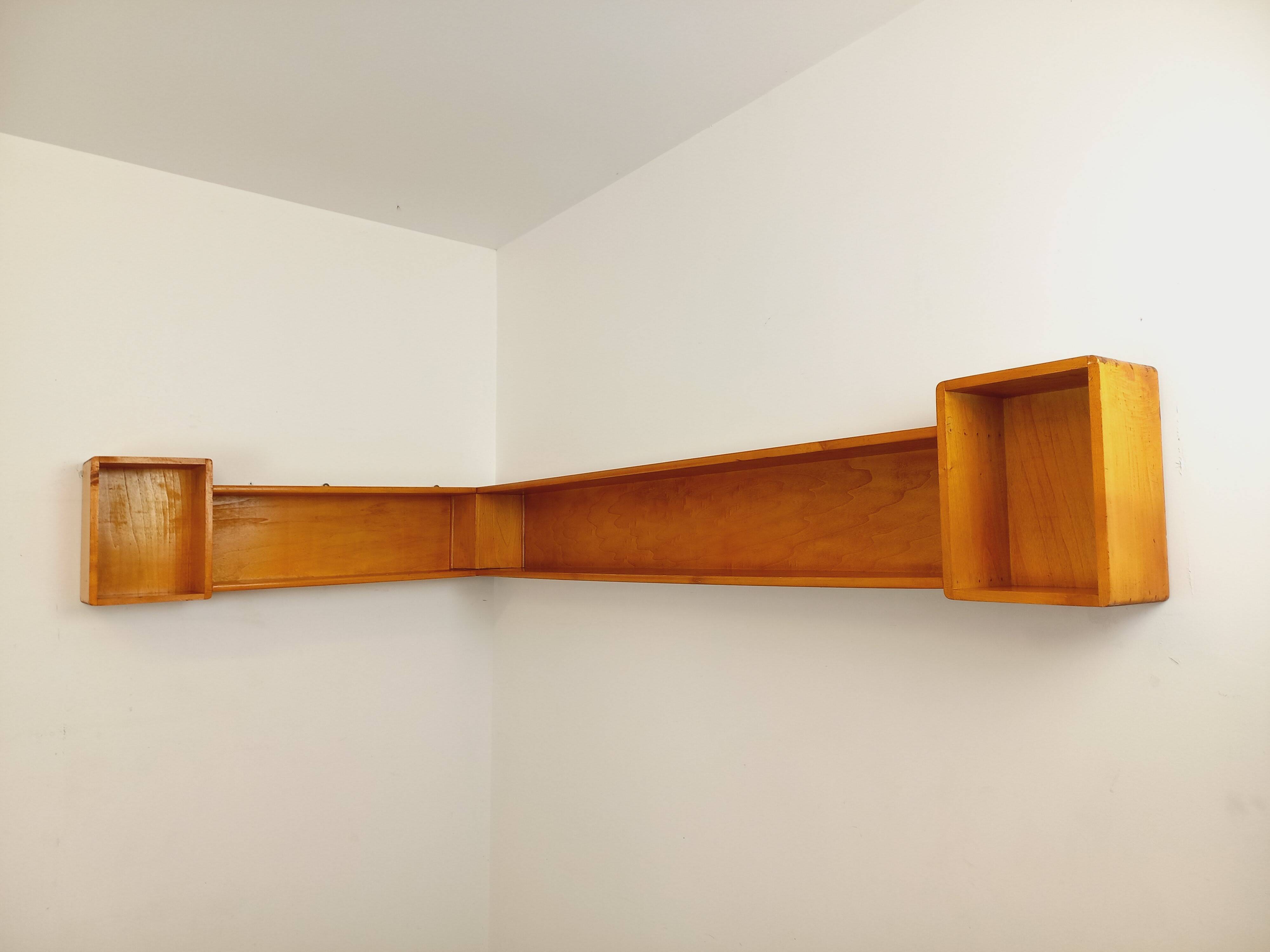 Vintage wooden corner wall shelf from the 60s 70s.