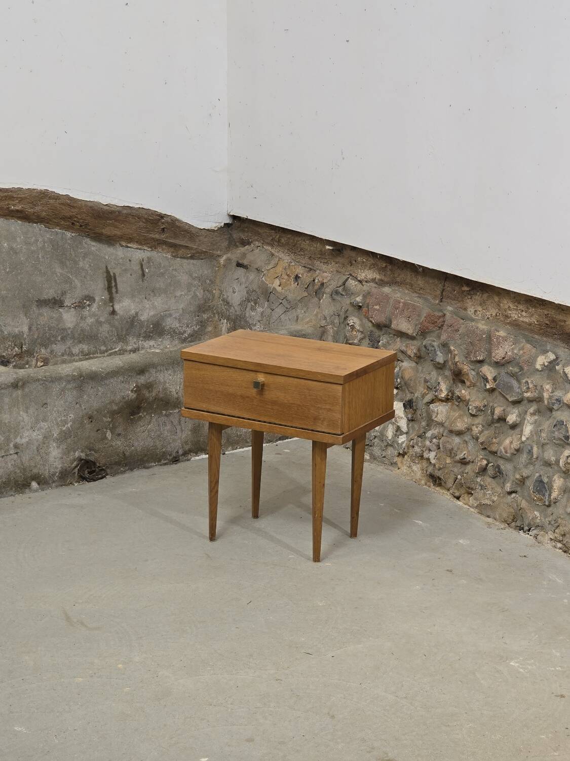 Scandinavian bedside table with hinged drawer