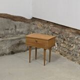 Scandinavian bedside table with hinged drawer