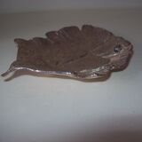 Empty pocket in silver metal