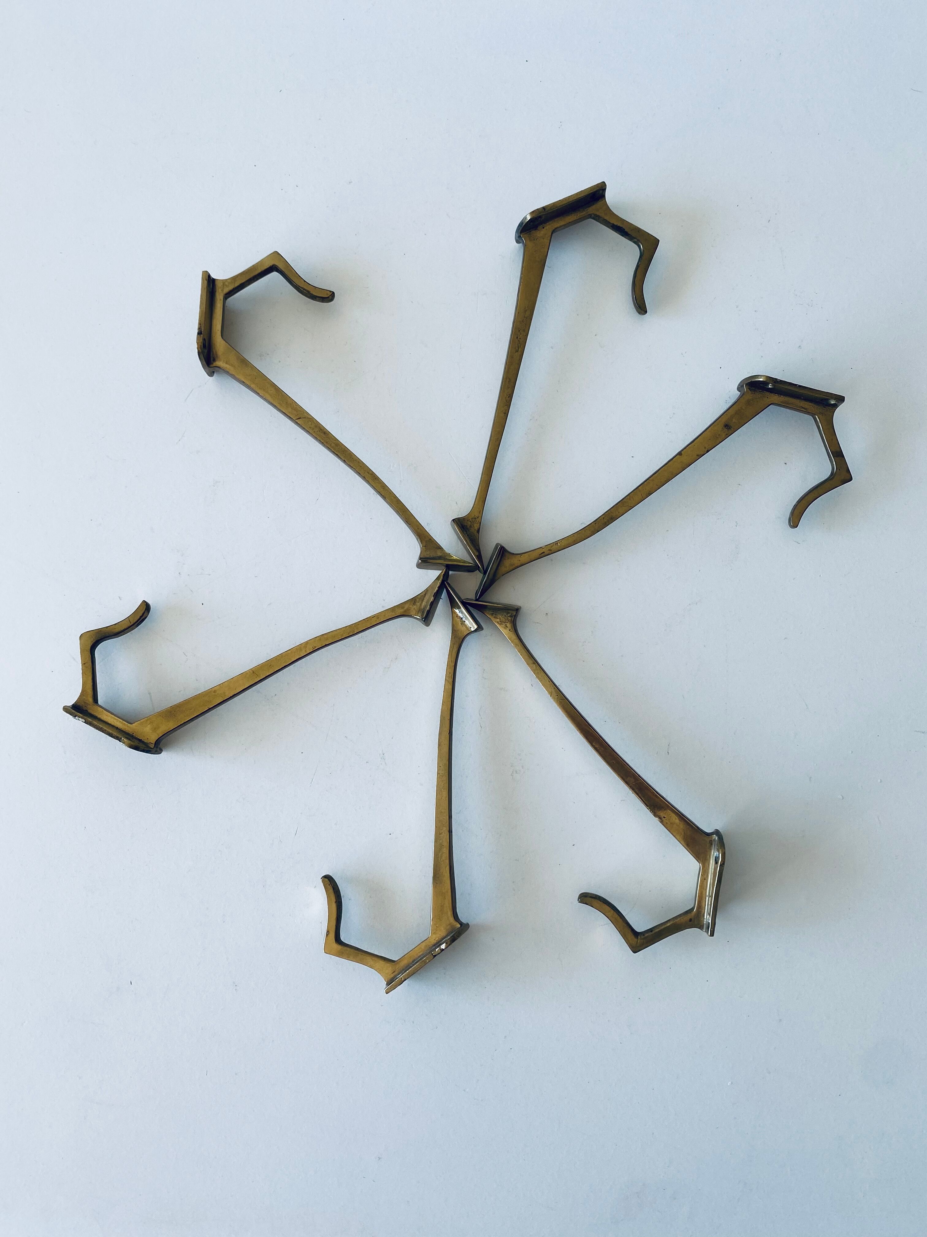 Pair of vintage brass hooks