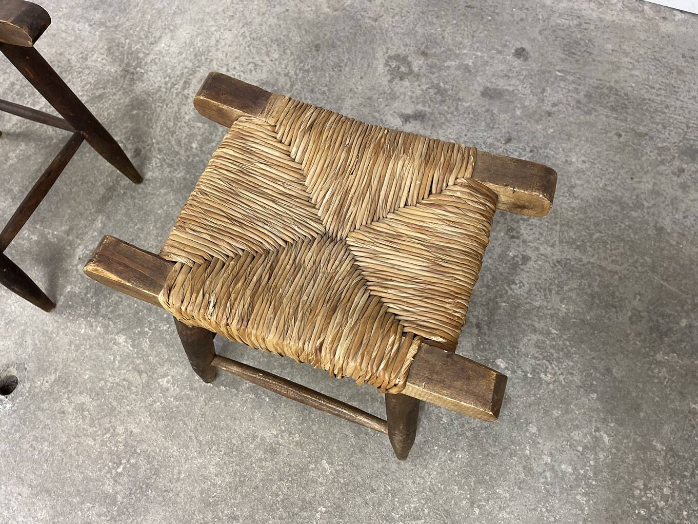A pair of 1950s straw stools.