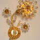 Sconce in gilded brass in the shape of a flower by Palwa, Germany, 1970s.