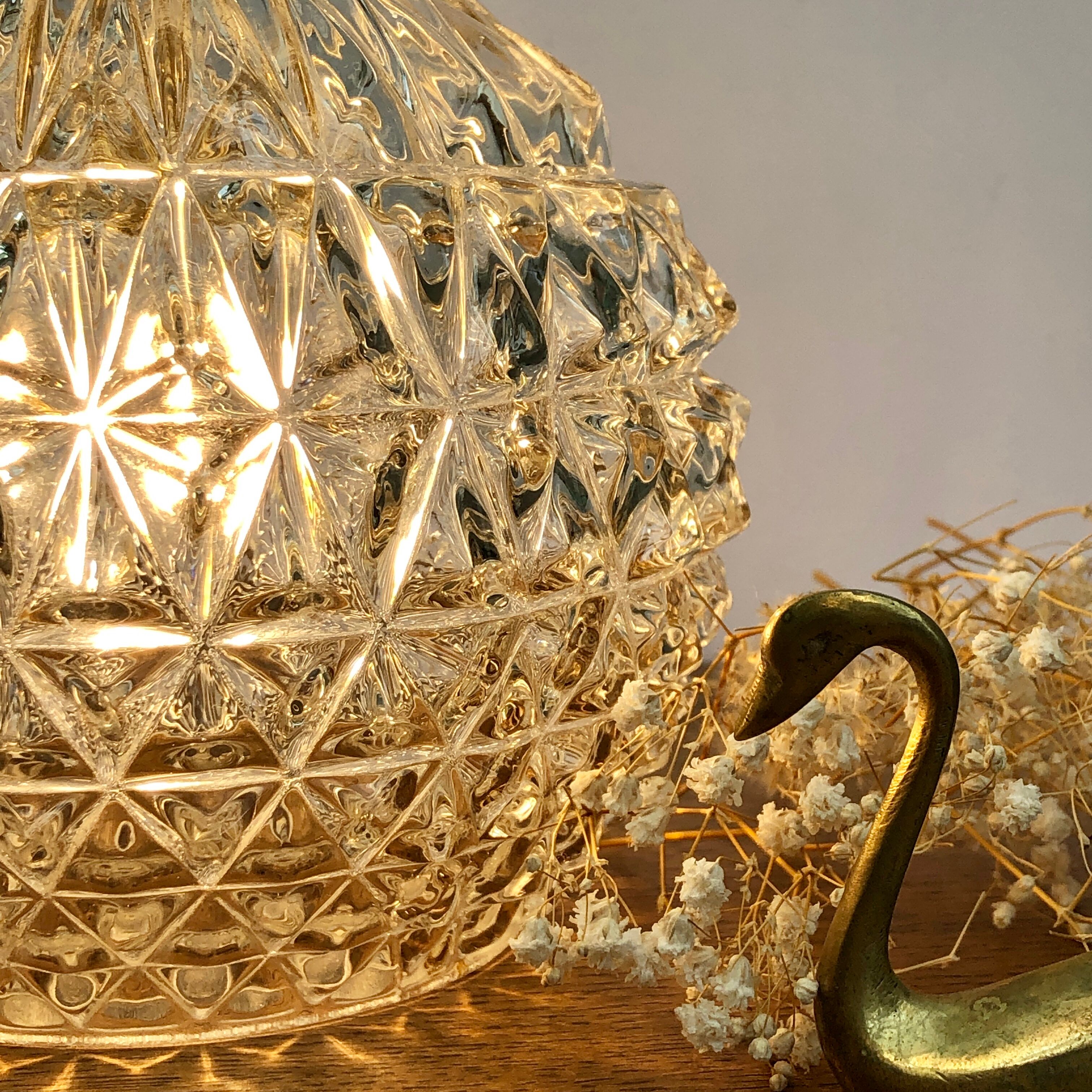 Vintage globe stroller in moulded glass