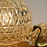 Vintage globe stroller in moulded glass