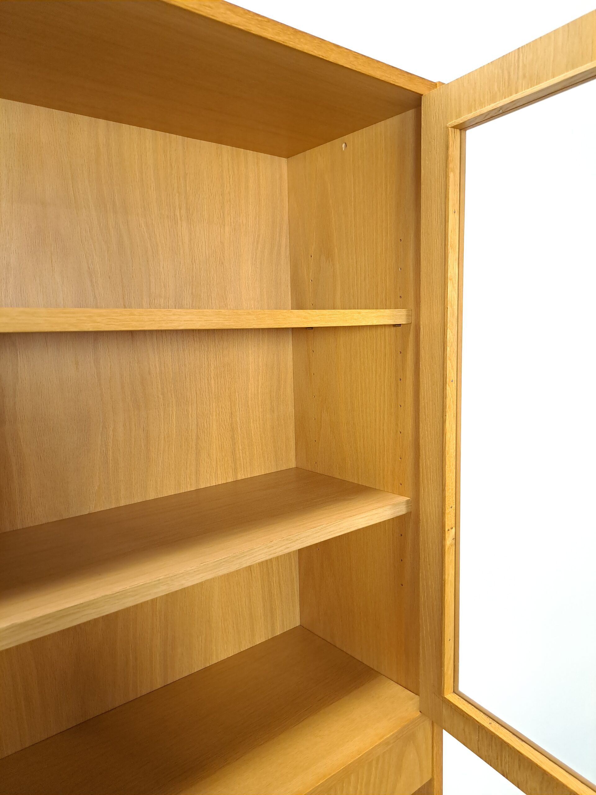 Tall LP display cabinet with glass doors and magazine shelf from Sweden