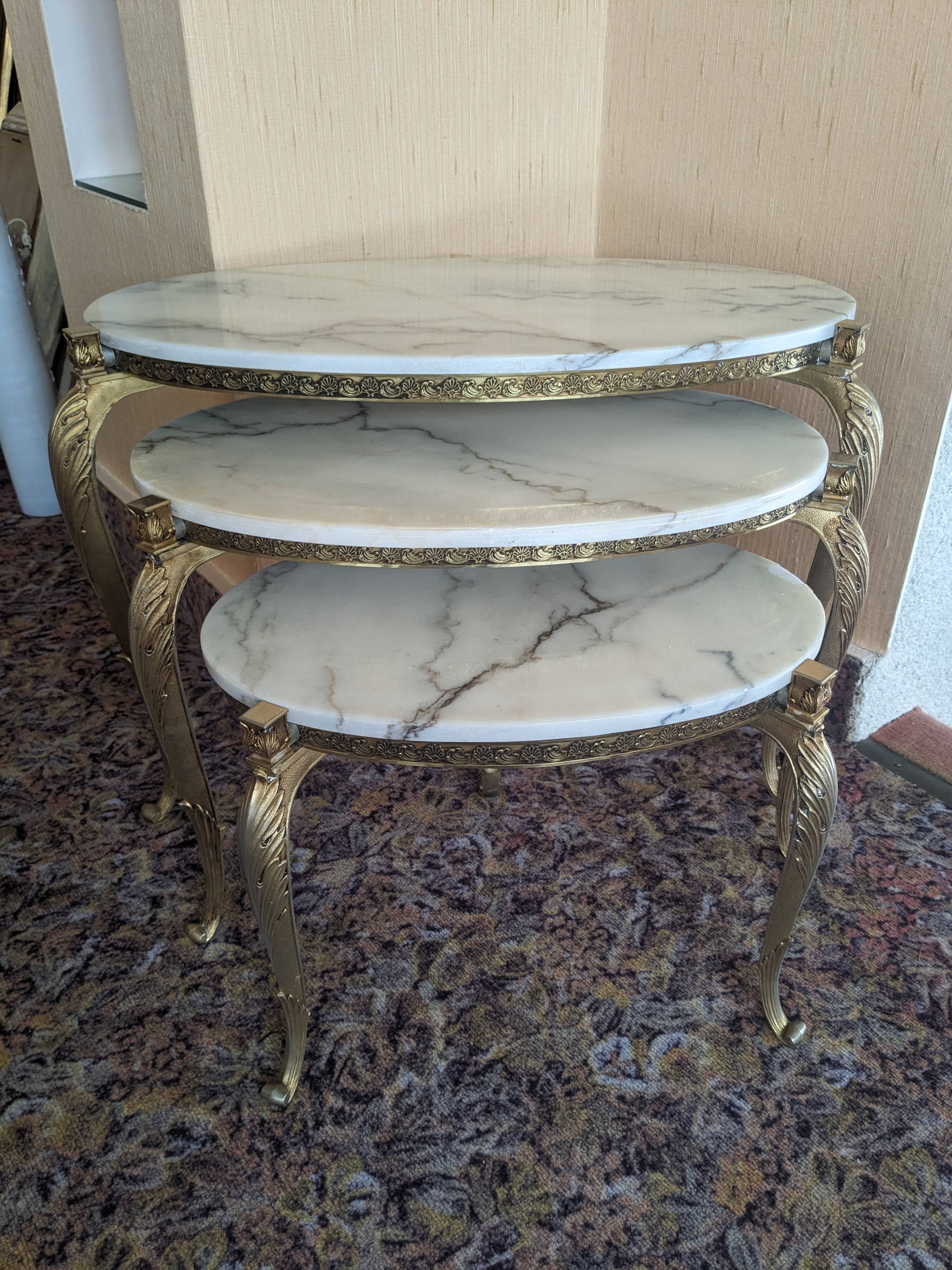 Nesting tables in white marble and bronze