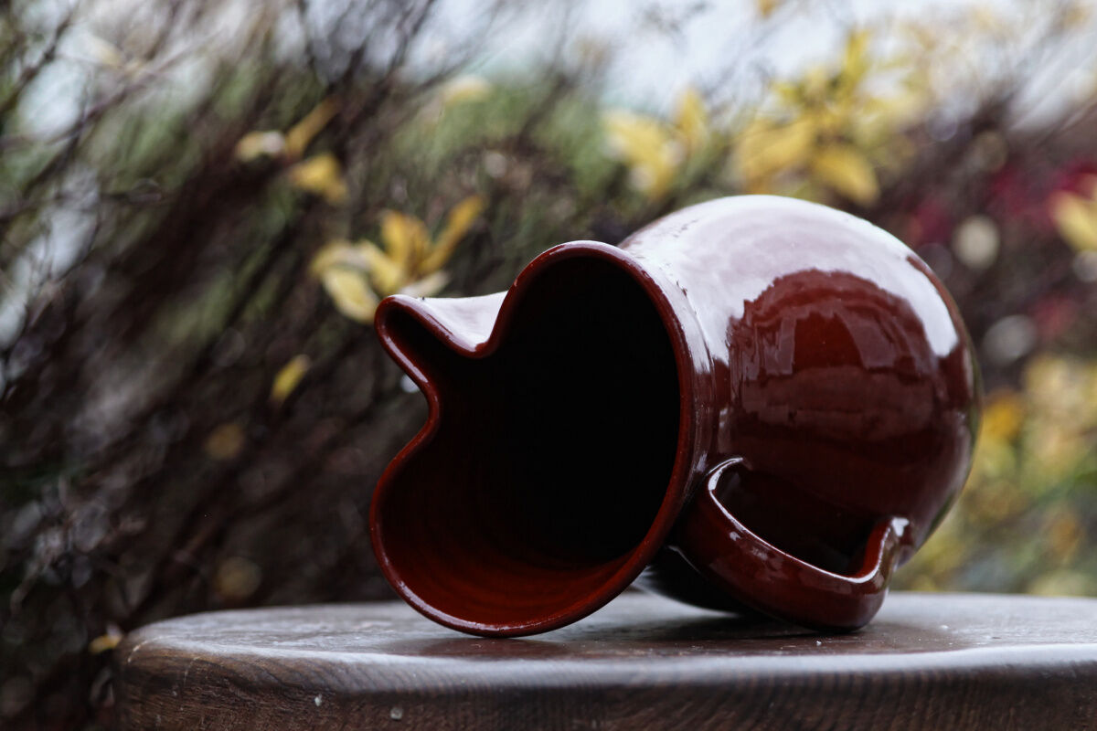 Terracotta pitcher, rust colour