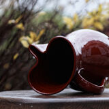 Terracotta pitcher, rust colour