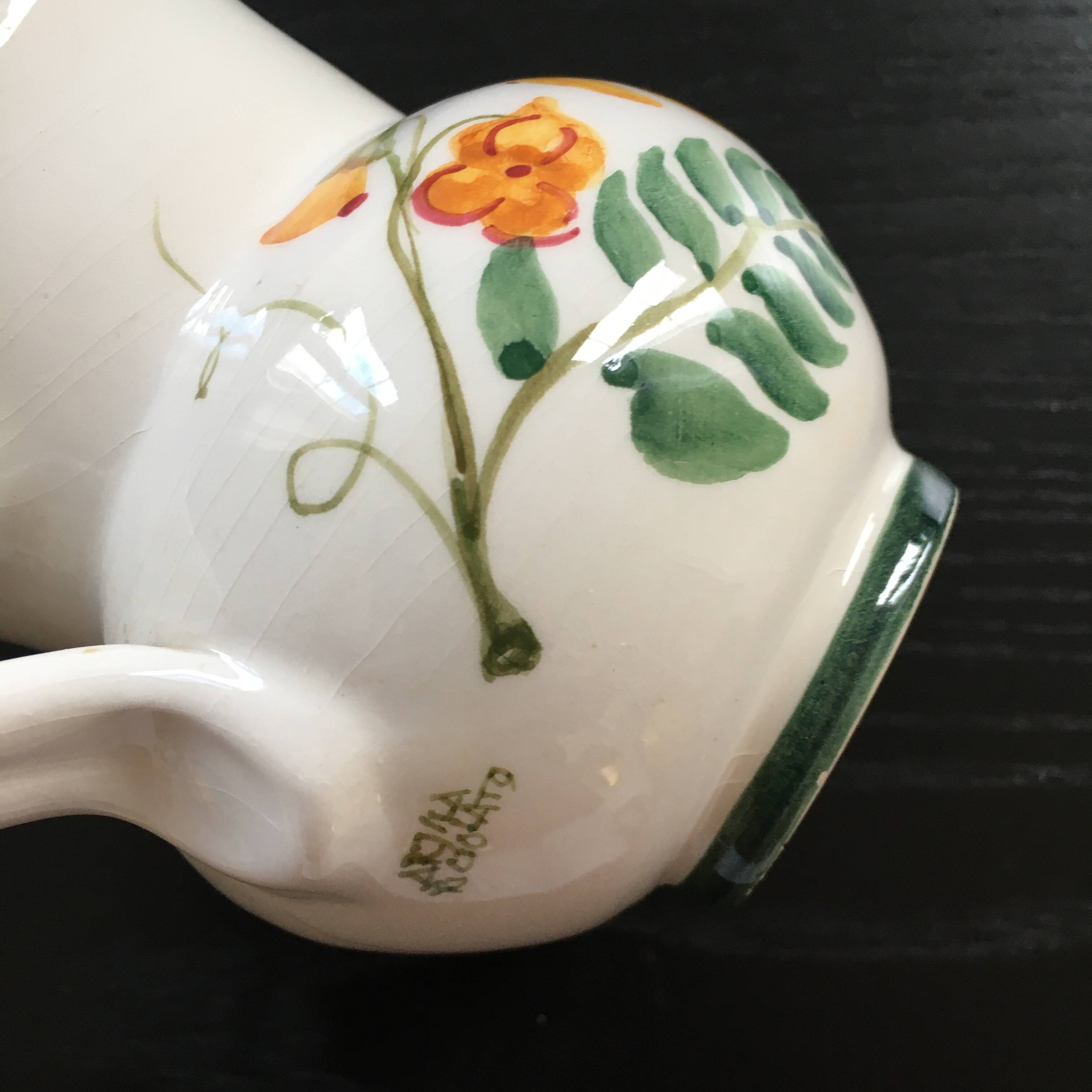 Small pitcher with floral decoration