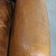 Sheep leather wingback chair finished with black piping