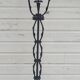 Black wrought iron floor lamp attributed to Gilbert Poillerat