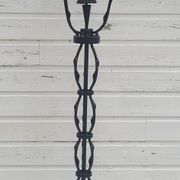 Black wrought iron floor lamp attributed to Gilbert Poillerat