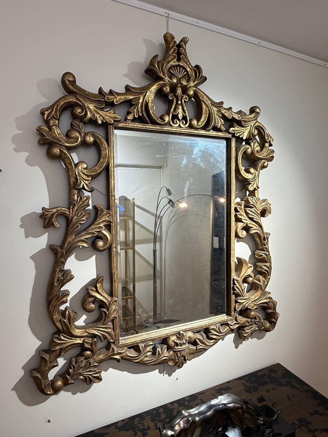 Gold wooden wall mirror with floral decoration