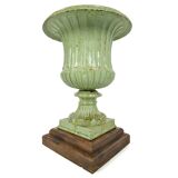 Pair of Medici cast iron vases with green patina