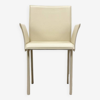 Beige leather chair with armrests
