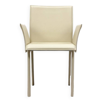 Beige leather chair with armrests