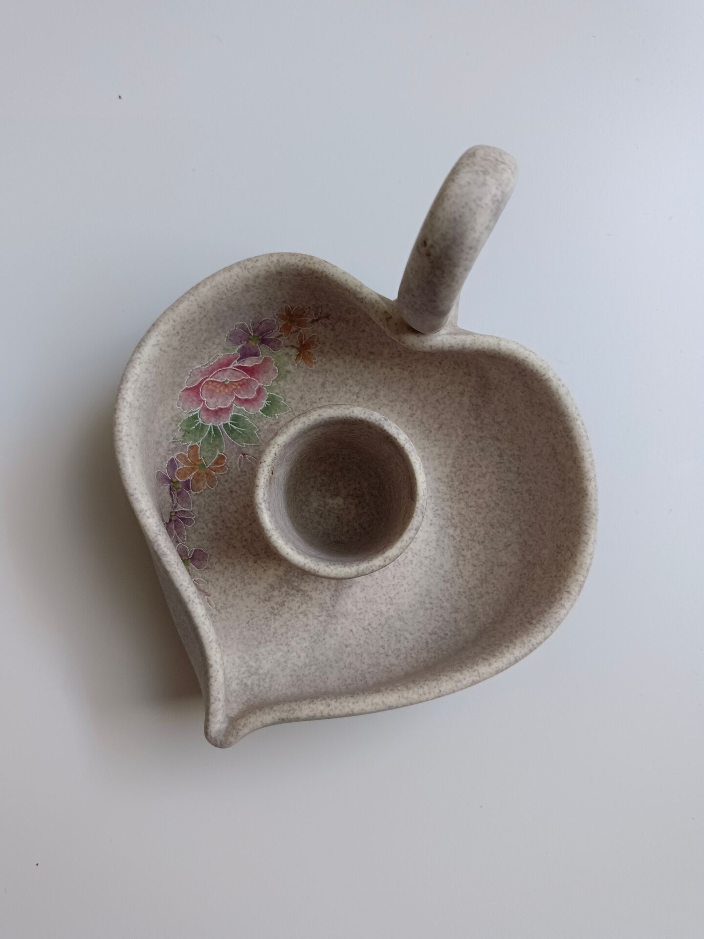 Vallauris grey candle holder with pink flowers, signed.