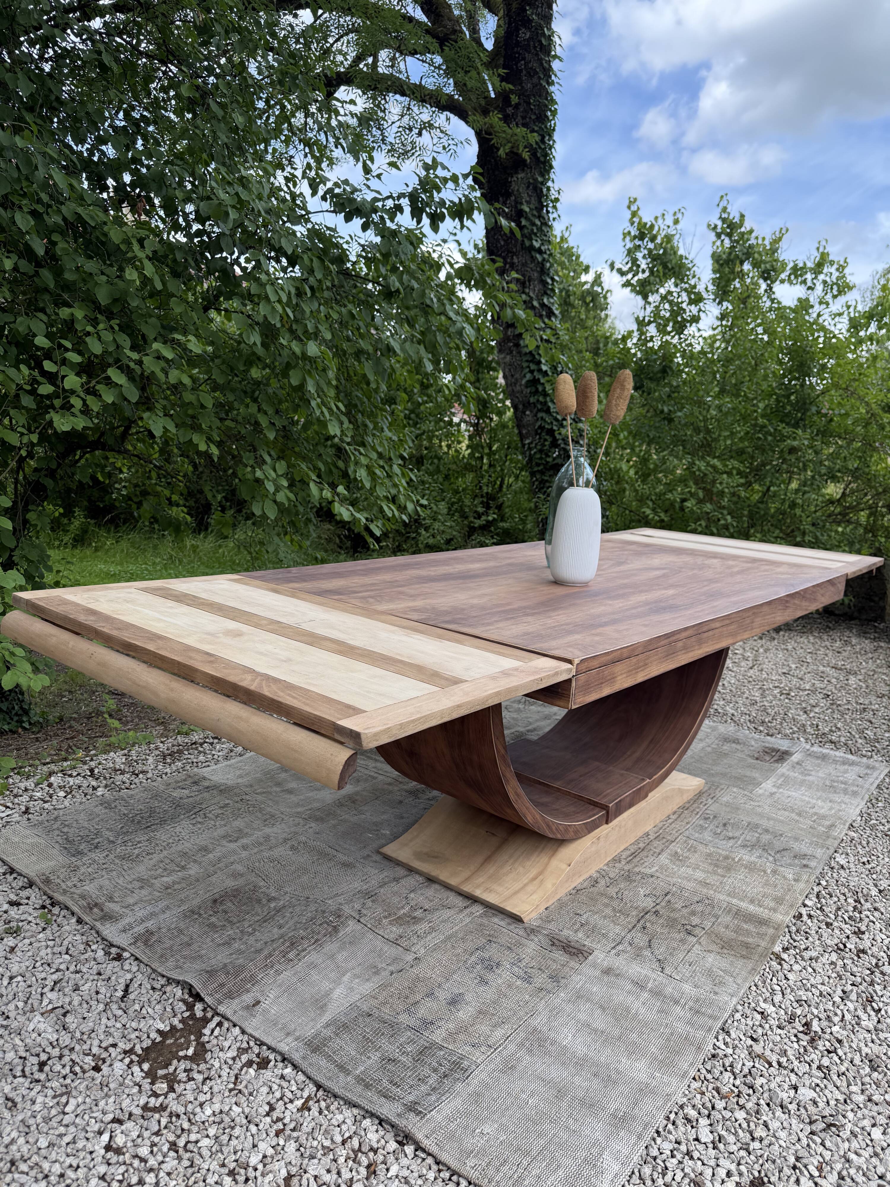 Renovated wooden table with extensions.