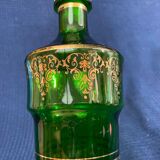 Green glass bottle and Louis style gilding