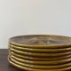 Set of 7 vintage khaki oyster plates