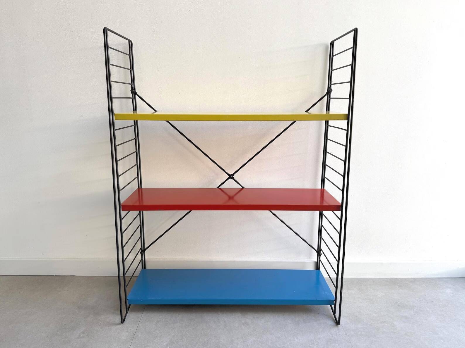 Early free standing Tomado bookshelves / shelving cabinet designed by D. De