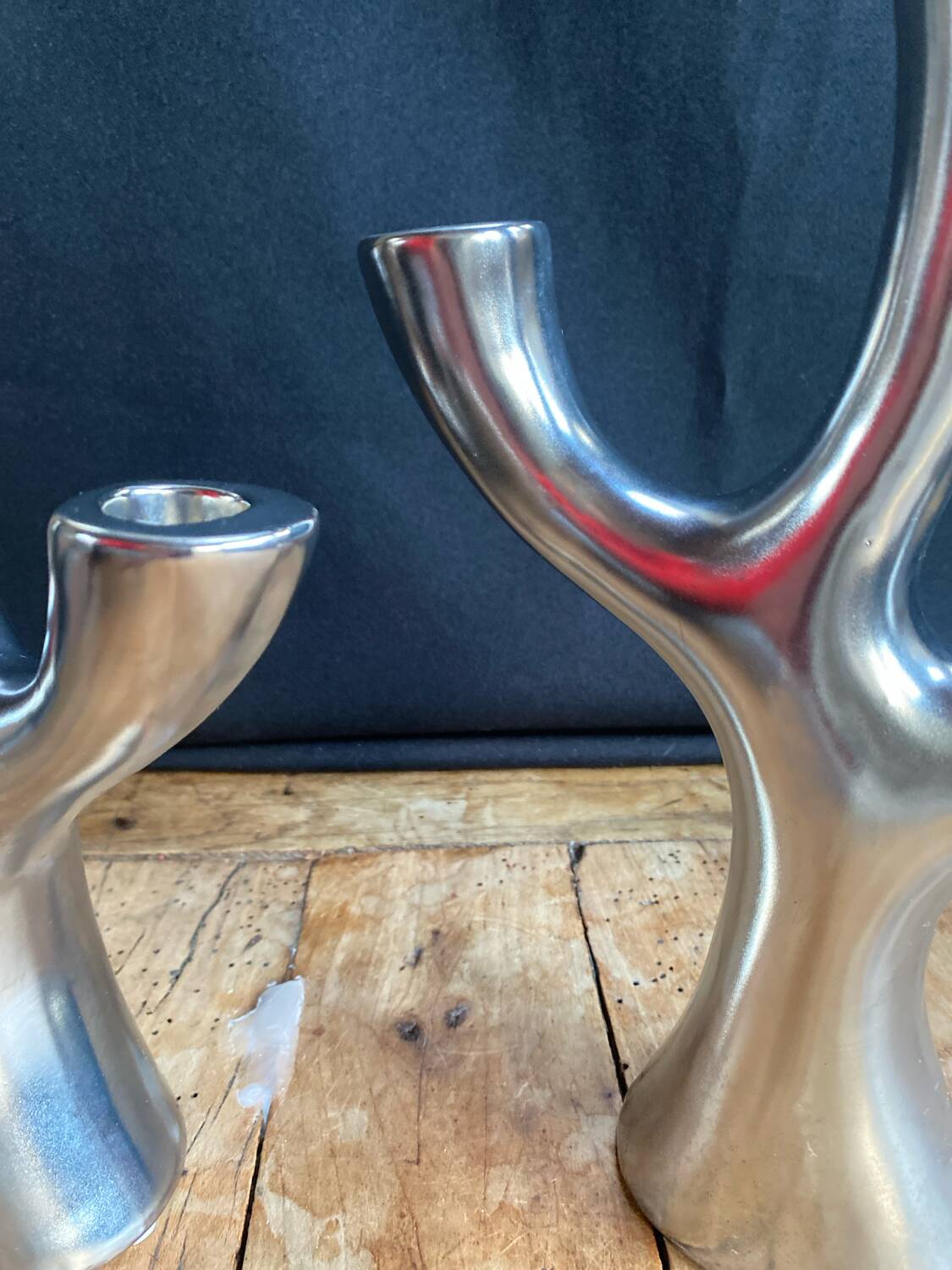 Silver candlesticks in the shape of a 3-branch tree