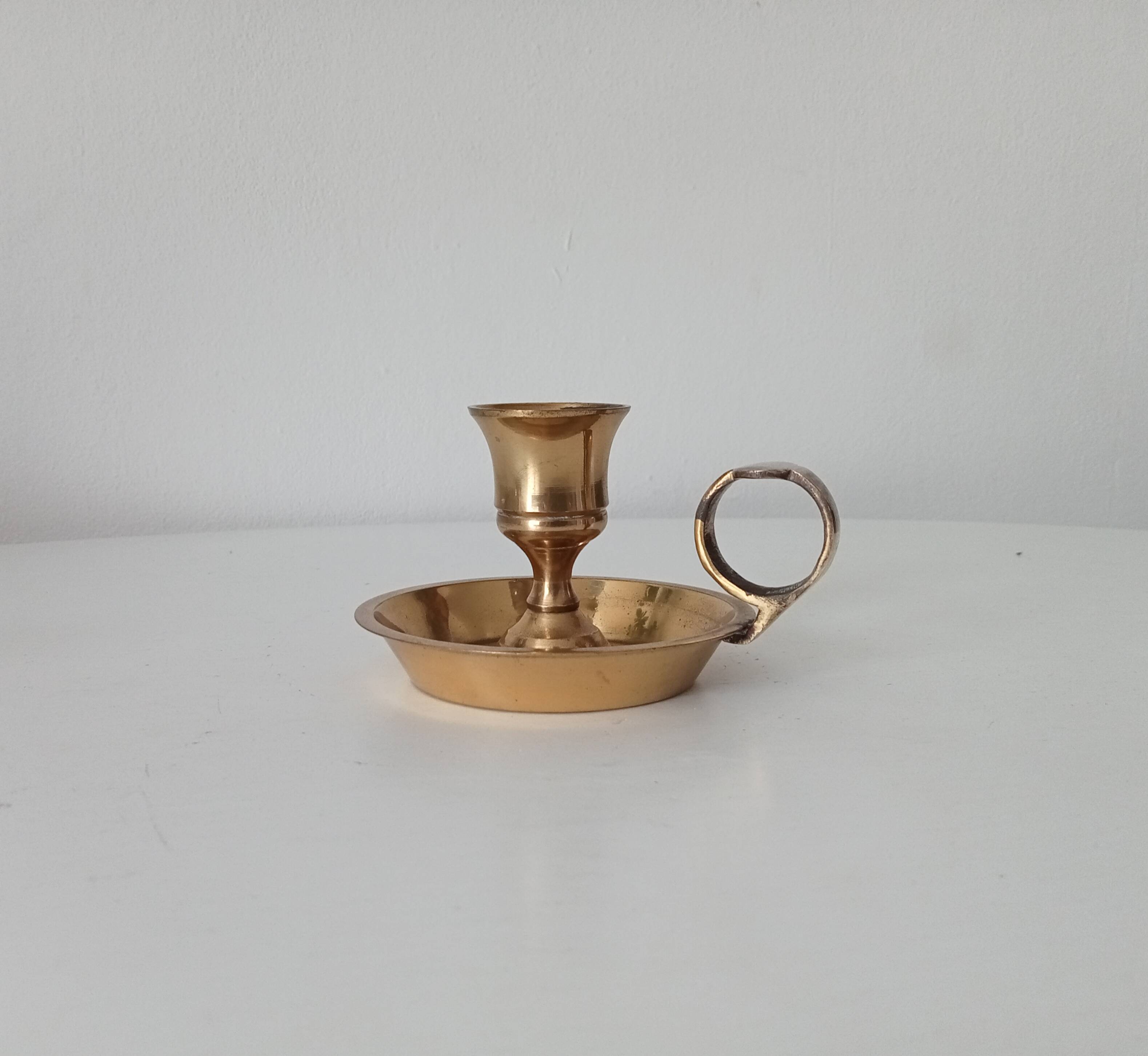 Vintage hand candle holder in solid golden brass