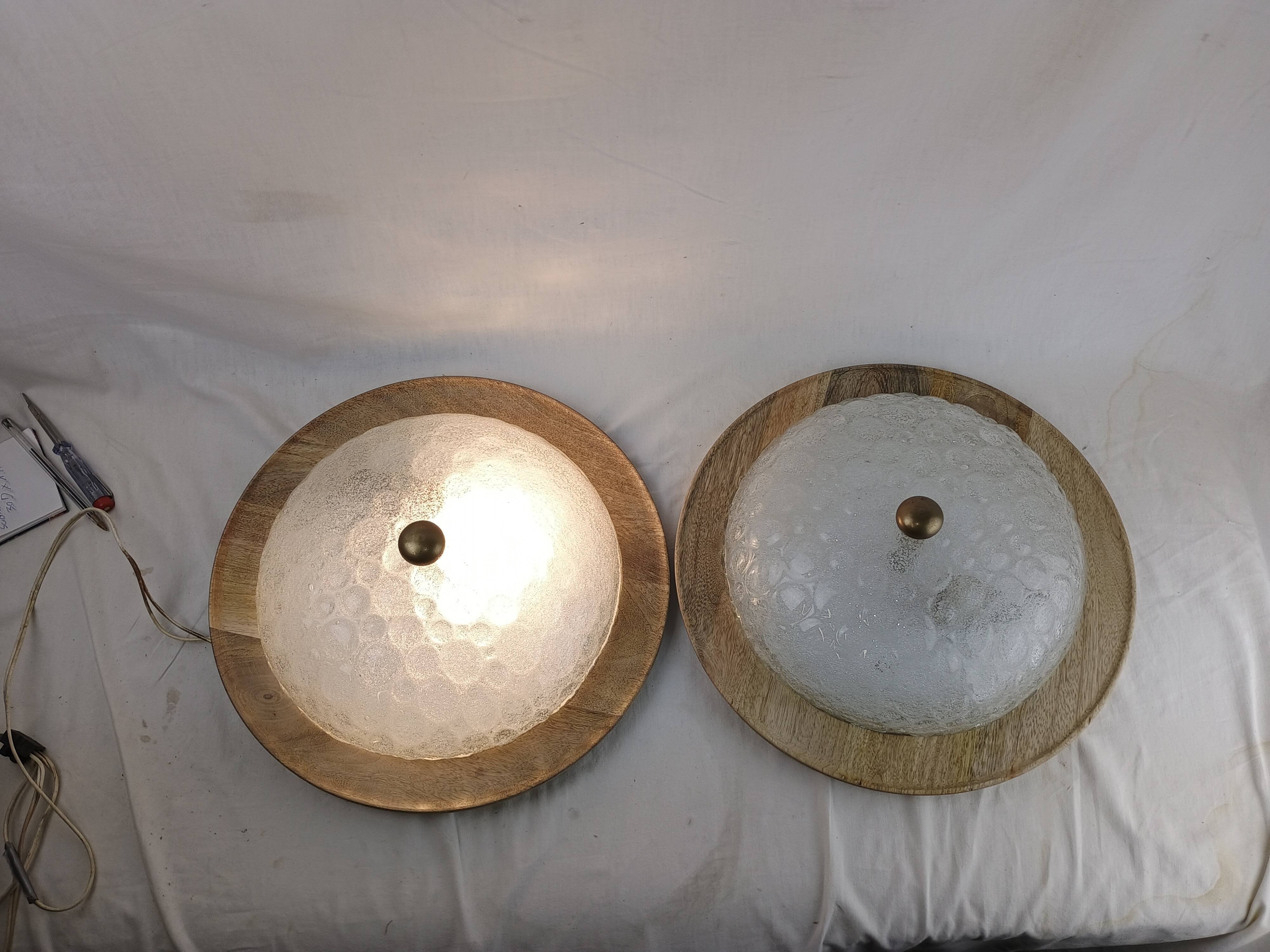 Pair of vintage Murano wall lights with exotic wood shelf.