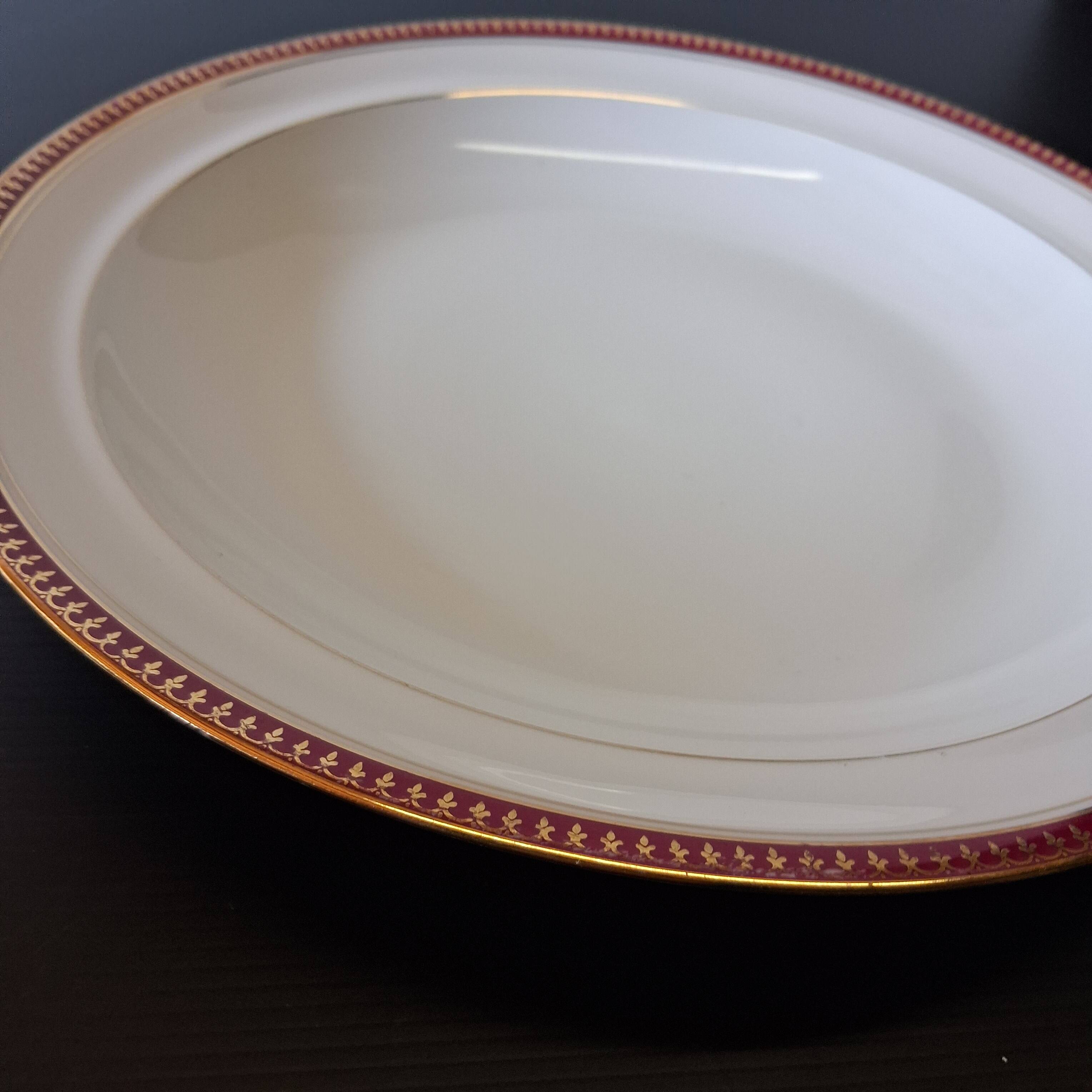 Round hollow serving plate in porcelain from Chastagner et Cie in good condition.