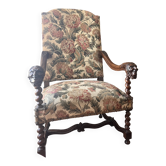 Antique armchair in Henri II style with masks