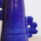 Handmade abstract ceramic vase with asymmetrical floral handles in midnight blue