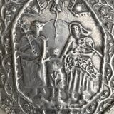 Small wall-mounted holy water font