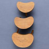 Trio of solid wood "bean" coffee tables