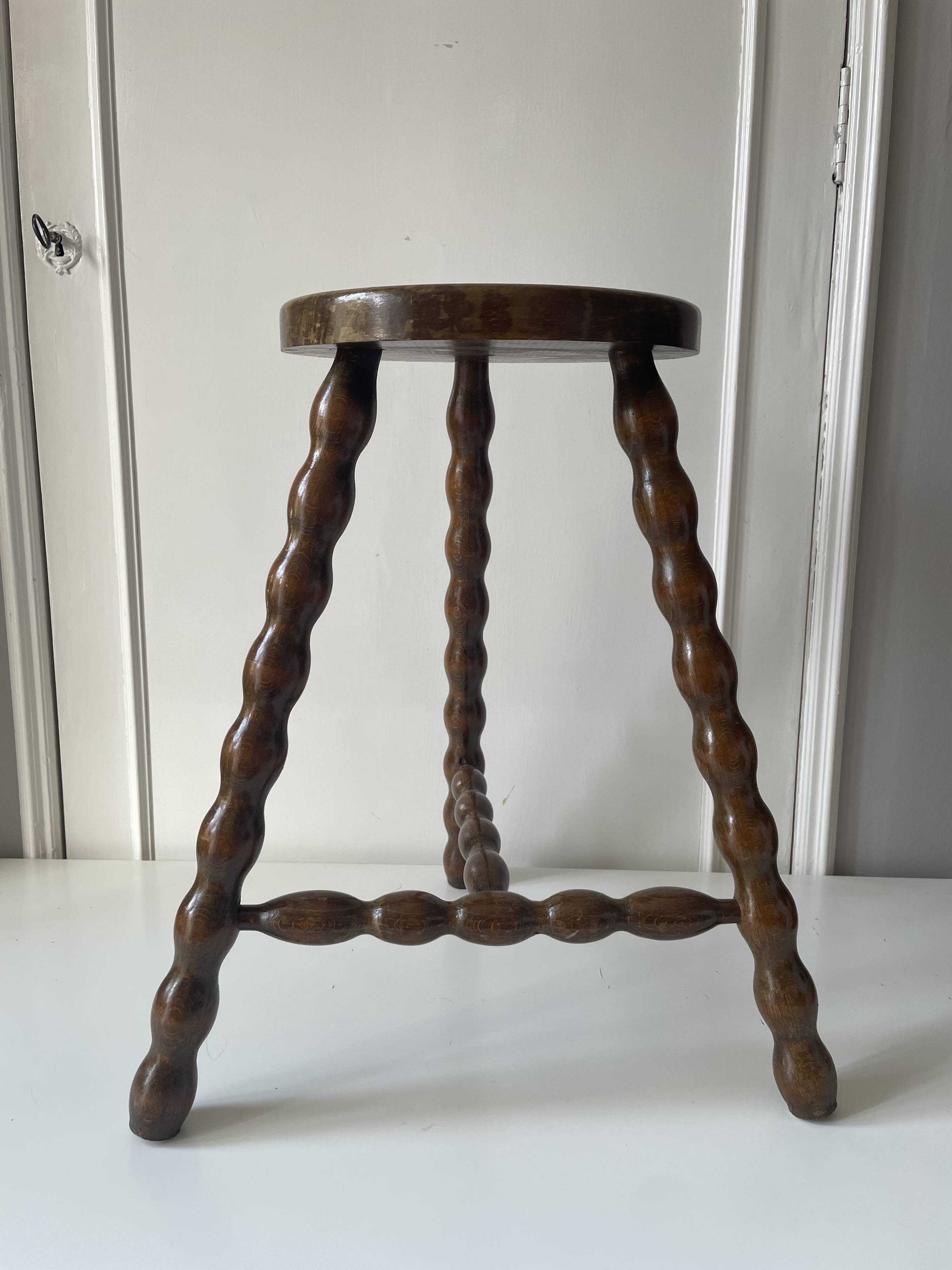 Wooden tripod stool