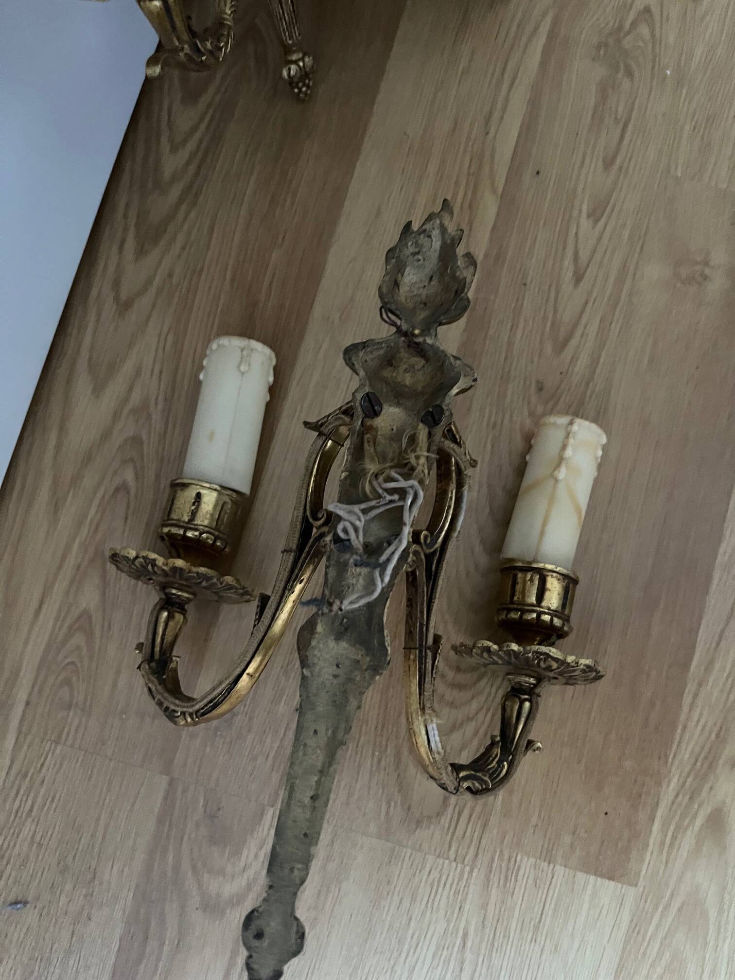 Pair of Louis XVI style bronze wall lights