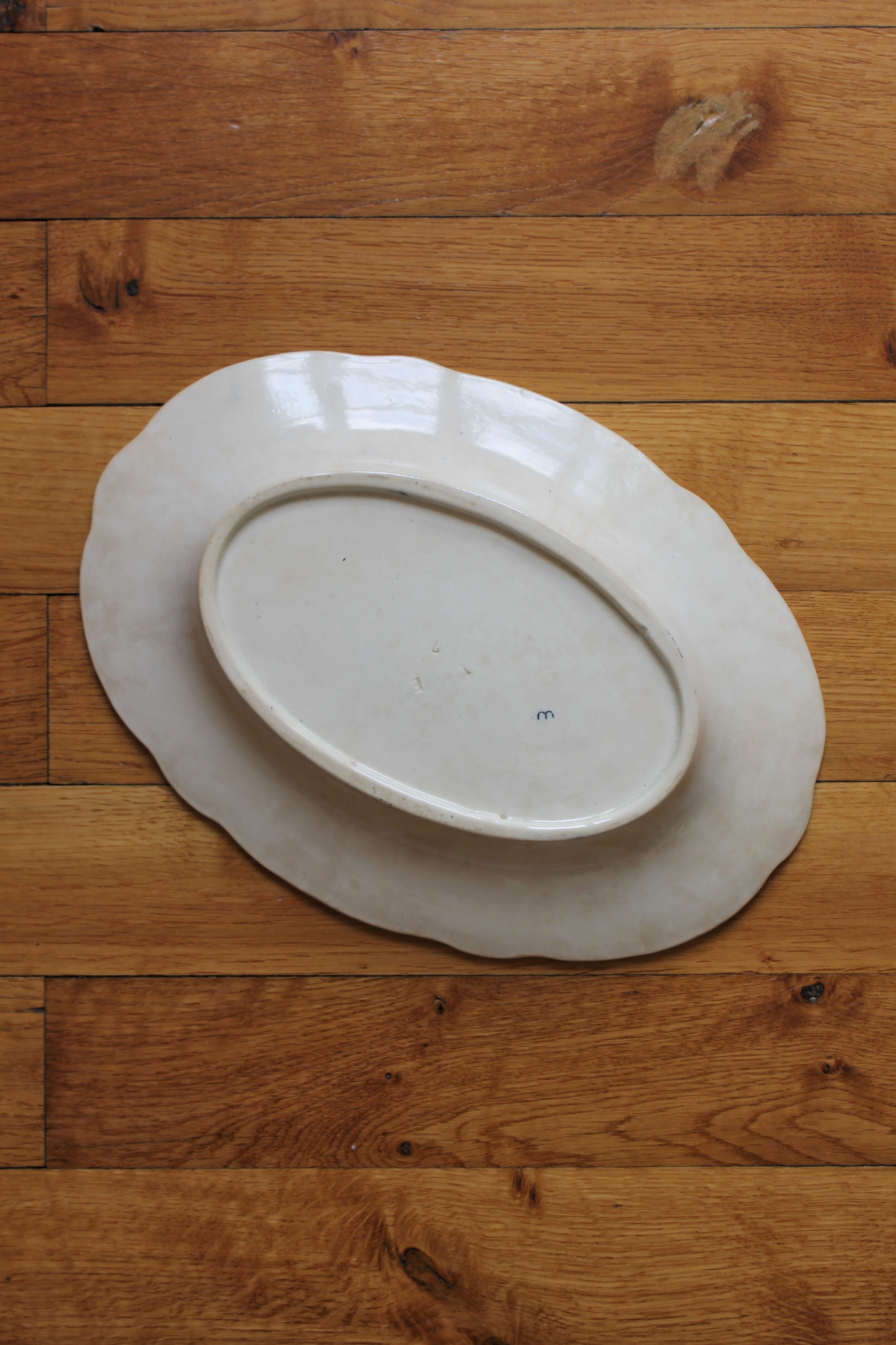 Oval ironstone dish with wheat and butterfly decoration, early 20th century