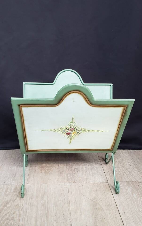 Vintage magazine rack in painted sheet metal