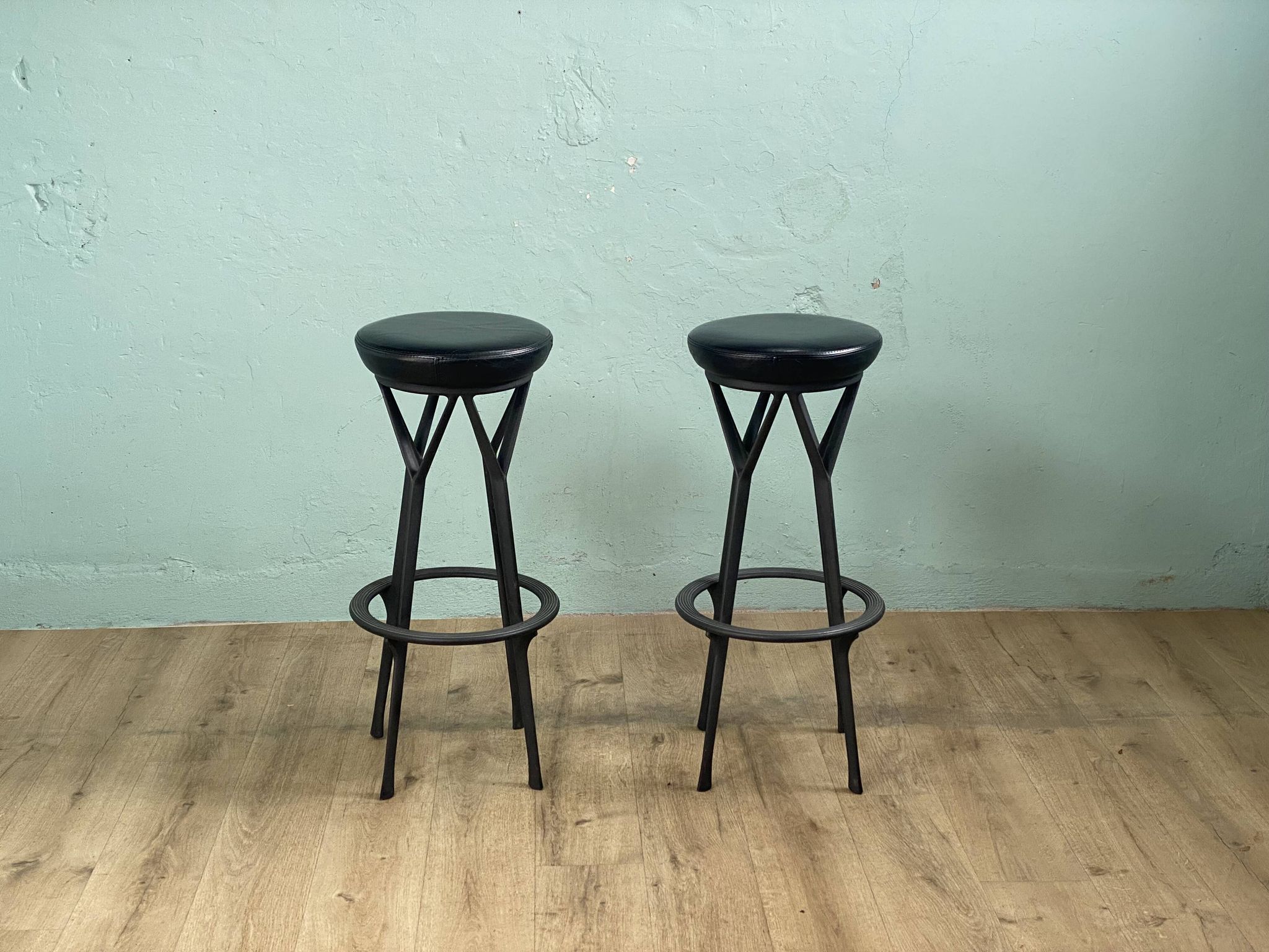 2 Yamakado designer swivel stools in black leather