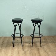 2 Yamakado designer swivel stools in black leather
