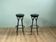 2 Yamakado designer swivel stools in black leather