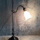 Adjustable lamp in painted metal with frosted glass tulip