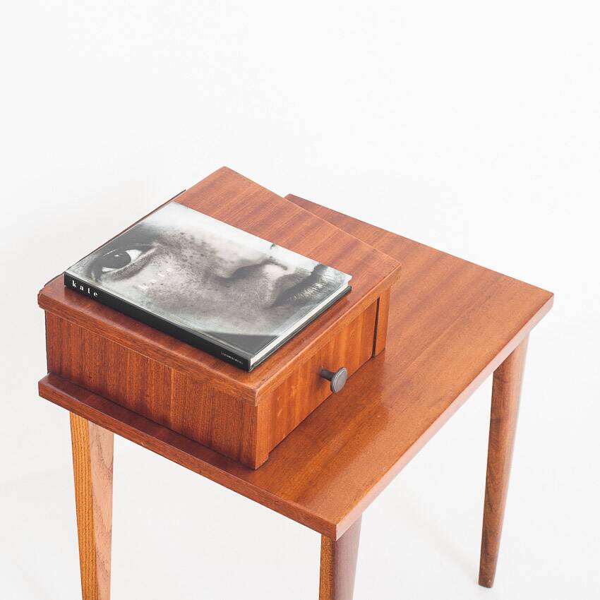 Vintage bedside table. Varnished wood. France, 1960s.