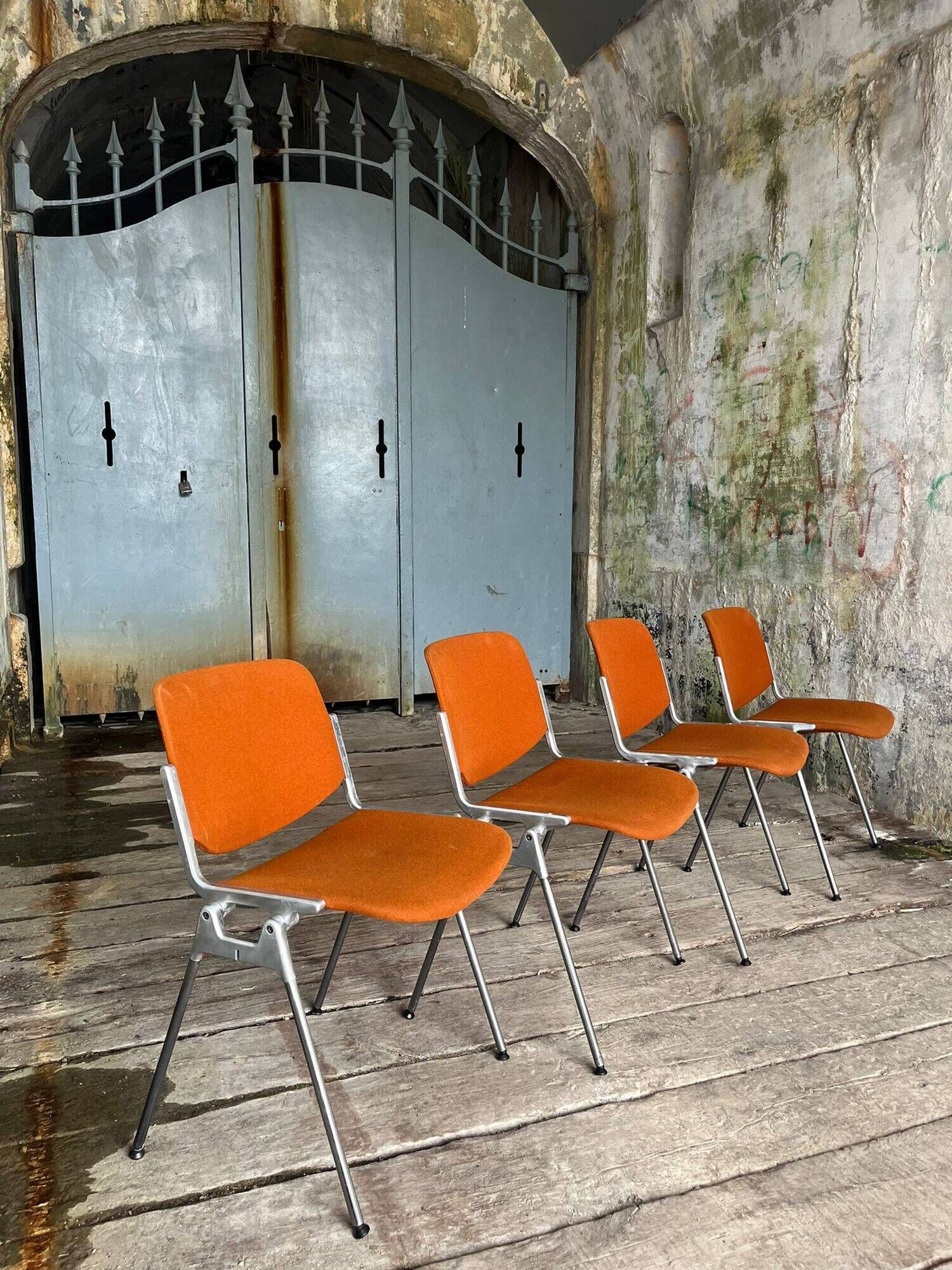 DSC 106 chair in orange by Giancarlo Piretti for Castelli, 1970s.