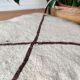 Berber Moroccan pouf in black and white.