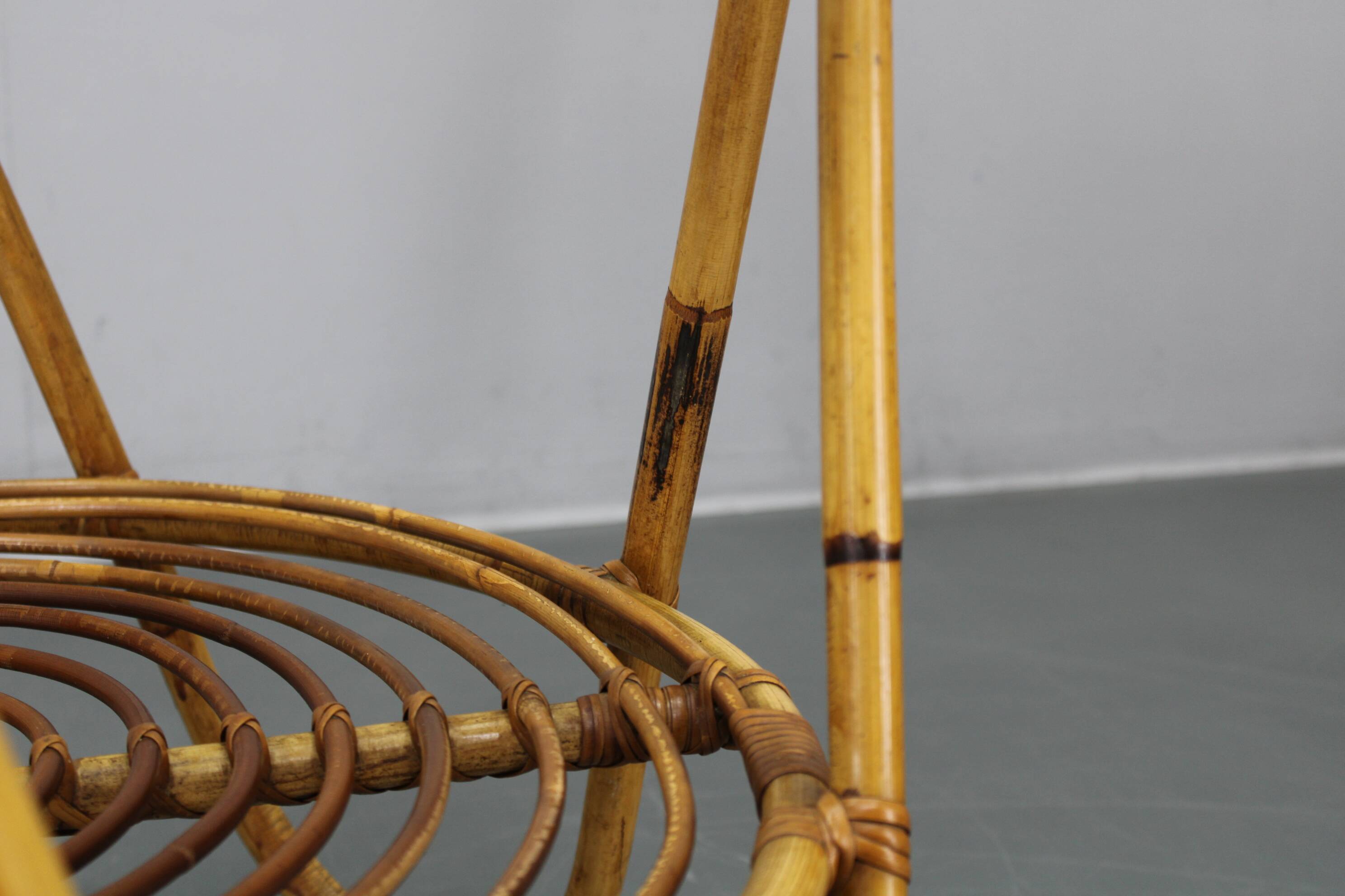 1960s Italian rattan coffee table with glass top, mid-century round design