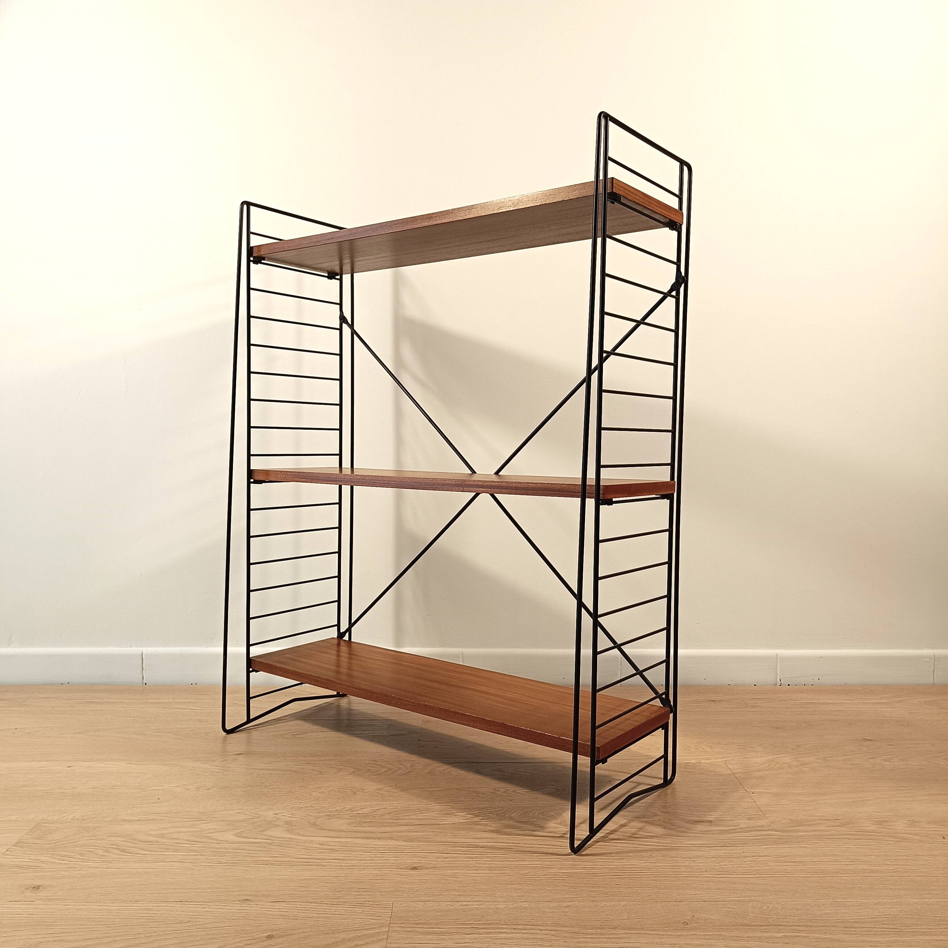 Mid century free standing rack with teak shelves by Dekker – Tomado