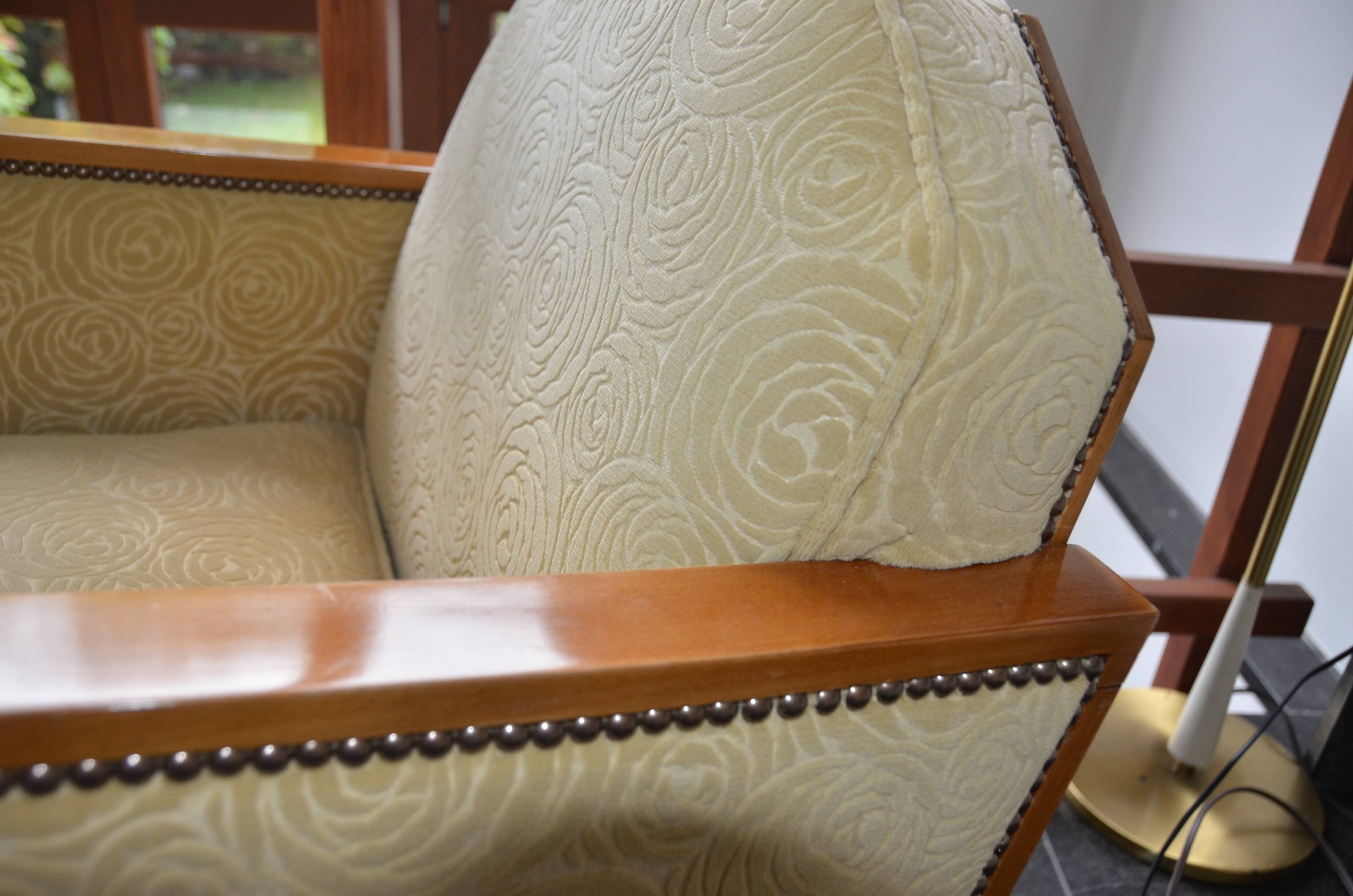 Pair of Art Deco armchairs and poufs