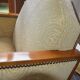 Pair of Art Deco armchairs and poufs