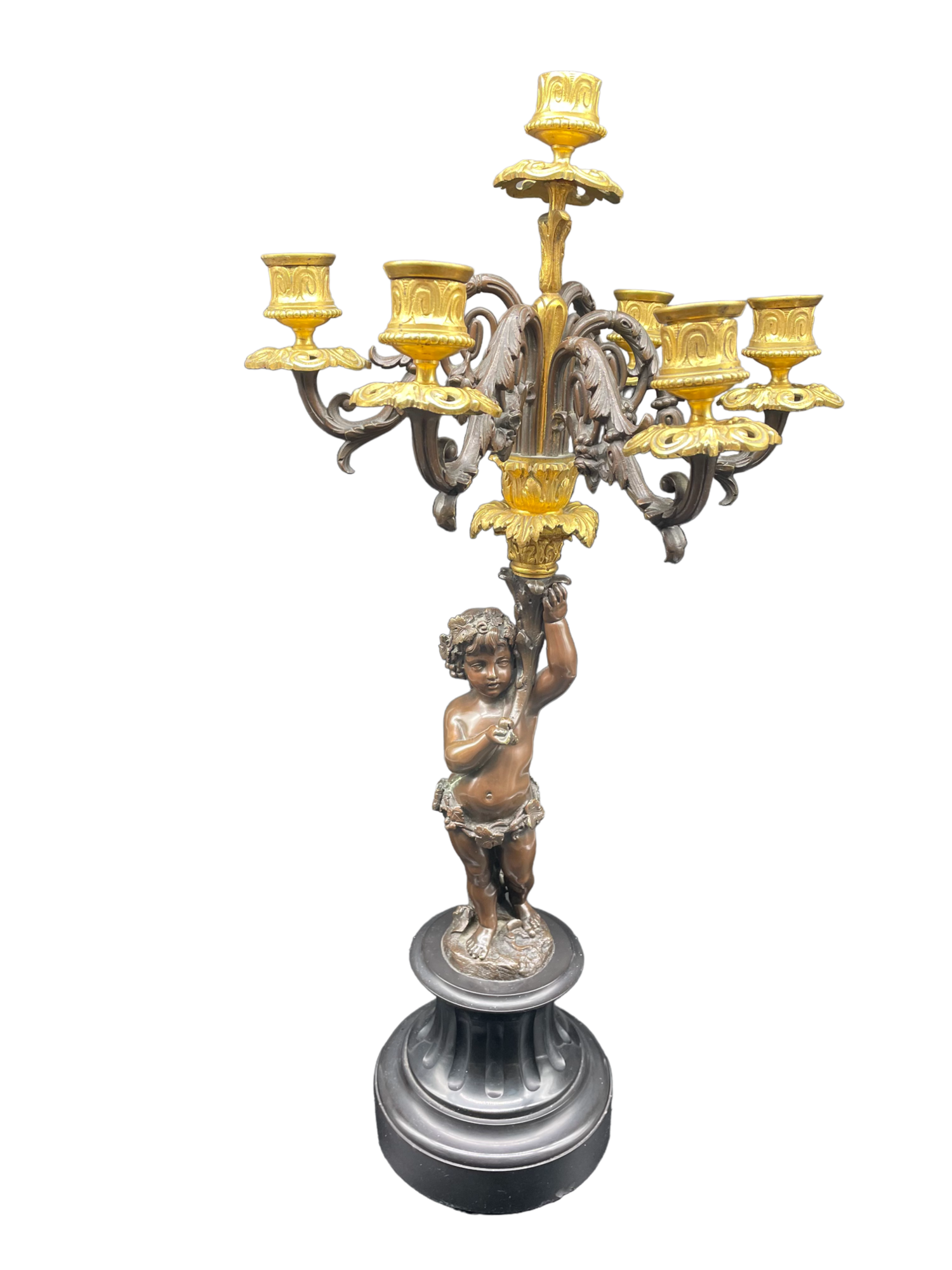 Candelabra with cherub in patinated bronze